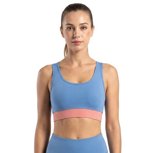Sujetador deportivo azul para mujer con banda de contraste rosa, cuello en U, espalda cruzada, alta sujeción, yoga, sin costuras, transpirable, elastano, poliéster, logo frontal - Product Image 1