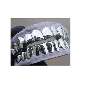 Grillz dentaires plaqués or écologiques pour hommes, avec diamants et finition élégante, disponibles au meilleur prix du marché - Product Image 1