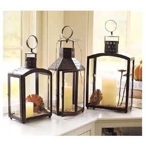 Dark Metal Lantern Rectangular Glass Panel Candle Holder with Dome <b>Top</b> Ring Handle Cutout Pattern and Three Pillar Candles Light - Product Image 1