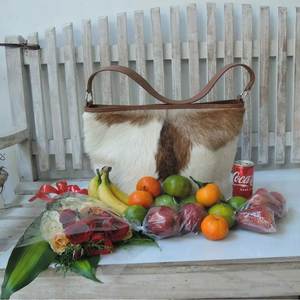 กระเป๋าโท้ทหนังแท้แบรนด์หรูสำหรับผู้หญิง คุณสมบัติป้องกันการโจรกรรม เหมาะสำหรับใช้ในช่วงฤดูร้อนและชายหาด พร้อมกระเป๋าใบเล็กเย็บลายวี ผลิตจากโรงงานโดยตรง - Product Image 2