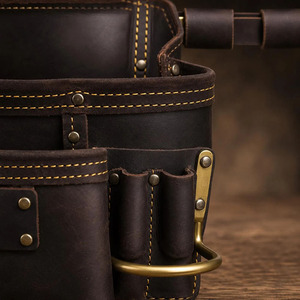 Cinturón de trabajo profesional de cuero genuino con múltiples bolsillos para herramientas, soporte seguro para martillo, construcción duradera a un precio razonable. - Product Image 2