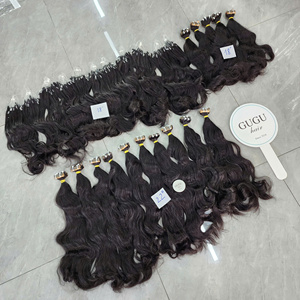 เทปต่อผม 8 ชิ้น ขนาด 32 นิ้ว ผมแท้ 100% แบบเวอร์จิ้น  ต่อผมด้วยเครื่องจักร  แบบดับเบิ้ลเวฟท์  ลอนธรรมชาติ สีธรรมชาติ ผมเวียดนามแท้ GUGU HAIR - Product Image 2