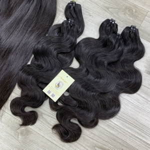 Extensiones de cabello virgen vietnamita natural negro, ondulado y liso, de doble trama, cosidas a máquina, al por mayor, directamente de fábrica. - Product Image 5