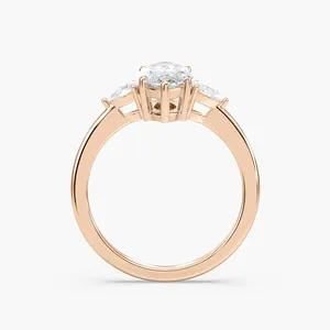 Anillo de compromiso de tres piedras con diamante marquise de 2 quilates y diamantes laterales en forma de pera, elaborado en oro rosa, oro blanco, oro amarillo, elegante. - Product Image 2