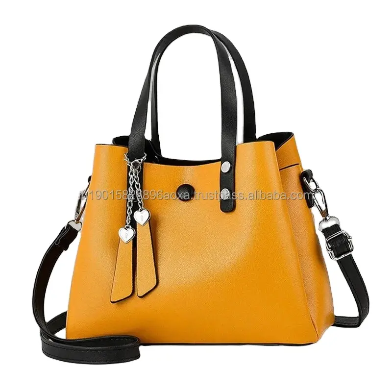 Latest design woman handbag specially design for female yellow color with black strap hand bag customize logo
