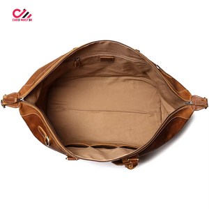 CARE MASTER Genuine Leather Vintage Travel Duffel Bag Rectangular Soft Shell With Rivet Design Buckle Closure Unisex - Product Image 2