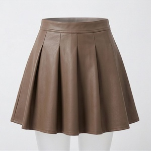 Jupe courte plissée en similicuir taille haute pour femme, couleur unie, design brillant, à porter toute l'année - Product Image 1