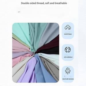 Camiseta de yoga para mujer, de manga corta, cuello redondo, corte ajustado, de secado rápido, con logotipo bordado personalizado, precio de fábrica de Bangladesh y China. - Product Image 4