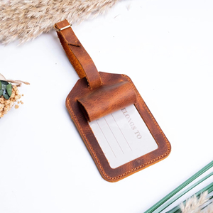 ป้ายแท็กกระเป๋าเดินทางหนังแท้ ป้ายปิดข้อมูลส่วนตัว ป้ายโลโก้สั่งทำ ป้ายกระเป๋าเดินทางสุดหรู ป้ายติดกระเป๋าเดินทางสั่งทำจำนวนมาก LMP-0236 - Product Image 1