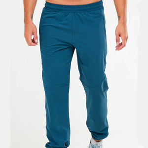 Wholesale <b>Men's</b> Solid Teal Cotton Fabric Sweatpants Elastic Waist Side Pockets Casual <b>Men's</b> <b>Joggers</b> For All Seasons - Product Image 4