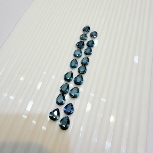 พลอยธรรมชาติ AJ Gems สีเขียวมอสไคยาไนต์ น้ำหนัก 1.25 กะรัต ขนาด 7*9 มม. จากราชสถาน สำหรับทำเครื่องประดับ รูปทรงลูกแพร์ - Product Image 1