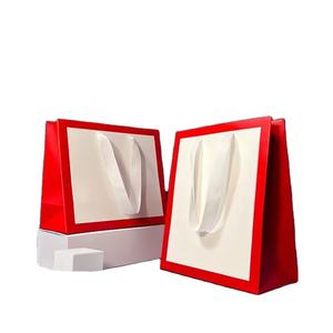 Bolsa de regalo de papel recubierto personalizada con asas Bolsas de papel Kraft de boutique personalizadas Al Por Mayor para uso en supermercados - Product Image 1