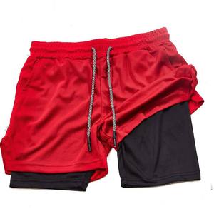 Shorts de sport double couche personnalisés en gros, fabricant et fournisseur OEM, polyester 150-220 GSM, marque privée, production en vrac - Product Image 1