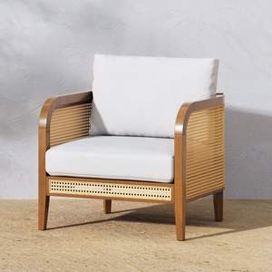 Chaise en teck de style bohème unique avec une touche de rotin naturel créant un look intérieur chaleureux, naturel et esthétique - Product Image 1