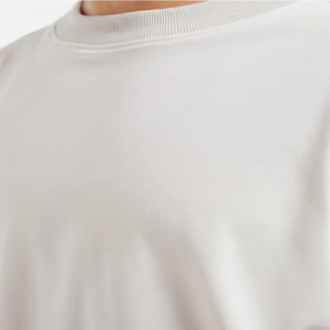 Camiseta de cuello redondo extragrande para mujer con logo frontal personalizado, al por mayor, de verano, manga corta, holgada, de jersey transpirable y ecológica - Product Image 6