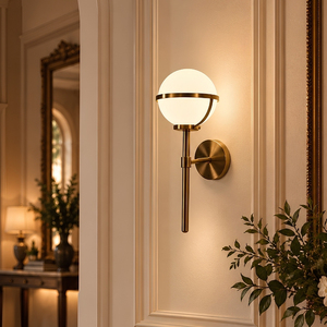 Modern Novera Brass <b>Globe</b> Wall Sconce, Opal Milk Glass Shade Wall <b>Light</b> Fixture with Metal Ring Detail - Product Image 1