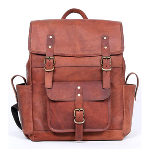 Mochilas de cuero fabricadas por OEM para hombres y mujeres, elegantes y a la moda, con diseño de patrón sólido. - Product Image 1