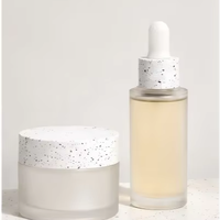 Bouteilles cosmétiques en PETG en gros, prêtes à l'emploi, forme ronde, sérigraphiées, avec compte-gouttes et flacons pompe-spray
