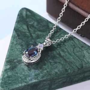 Collier pendentif ovale en Alexandrite avec accent Tanzanite, Or blanc, Bijoux de luxe pour femmes, Fabrication OEM ODM, Vente en gros - Product Image 1