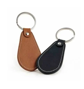 Llavero de cuero creativo al por mayor en color marrón y negro, llavero de cuero PU personalizado al por mayor con logotipo personalizado. - Product Image 1