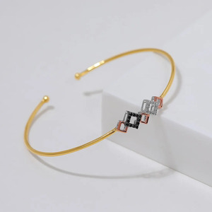 Black <b>White</b> <b>Square</b> Diamond Open Bangle with Yellow Gold <b>Frame</b> and Layered Geometric Center Design - Product Image 1