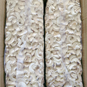 Trusted Factory Broken Cashew <b>Nuts</b> <b>Kernels</b> Kaju Badam Split Cashews SANTIGO Exported Worldwide - Product Image 2