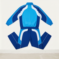 Conjunto Deportivo Unisex Azul con Bloques de Color, Chaqueta con Cierre y Cuello Alto, Estilo Deportivo, Transpirable, de Poliéster, para Adultos, Otoño