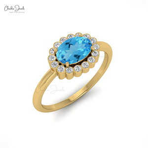Anillo de Halo con Topacio Azul Suizo Ovalado de 7x5mm de Alta Calidad, Oro Puro de 14k, Anillo de Compromiso y Boda, Proveedor Directo al por Mayor - Product Image 1