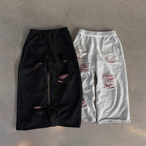 Pantalon de jogging double couche en molleton épais déchiré et vieilli, coupe large, style baggy, pour homme, fabriqué par des meilleurs fabricants - Product Image 1