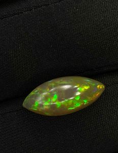 Ópalo etíope natural multicolor con efecto fuego, corte marquesa cabujón. Ópalo para joyería. Ópalo con patrón de panal de abeja. - Product Image 2