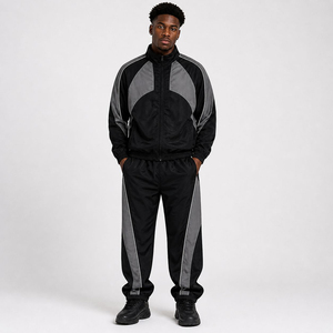 Survêtement unisexe en nylon avec empiècements, noir et gris, coupe-vent sportif à manches longues avec fermeture éclair et poches latérales, idéal pour l'été - Product Image 1
