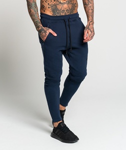 กางเกงวิ่งสีน้ำเงินเข้มของผู้ชายกางเกงผ้าฟลีซผ้าฝ้าย100% น้ำหนักเบาสวมใส่สบายพอดีกับผิวสำหรับฤดูหนาวรับโลโก้ขนาด XL - Product Image 1