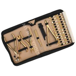 Kit complet d'outils d'extension capillaire avec applicateur, pince à micro-perles, pince à démonter, pince à bandes adhésives dorées, clips et crochet à boucle - Product Image 1