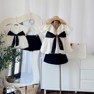 Ensemble deux pièces de haute qualité de style coréen pour femmes, chemisier à manches bouffantes uni noir, jupe mini au-dessus du genou, tenue d'été 100% coton - Product Image 1