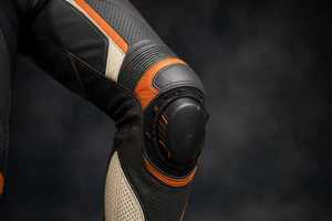 ชุดแข่งรถมอเตอร์ไซค์หนังสีดำส้มสำหรับผู้หญิง แบบชิ้นเดียว แขนยาว - Product Image 3