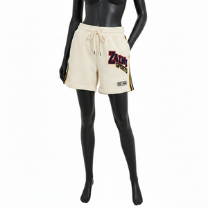 กางเกงบาสเก็ตบอลขาสั้นผู้หญิง ผ้าฟลีซโพลีเอสเตอร์พรีเมียม สีครีม เนื้อผ้านุ่ม แถบข้างผ้า แถบข้างผ้าลายทาง  โลโก้ปักแบบเชนิลล์ - Product Image 1