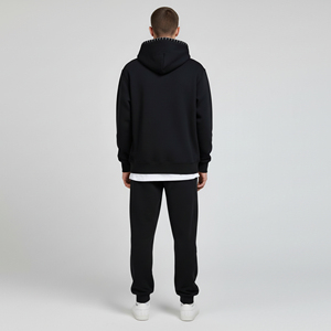 Ensemble de survêtement noir à capuche pour homme avec fermeture éclair intégrale, poches latérales et pantalon assorti – Collection Streetwear Automne - Product Image 4