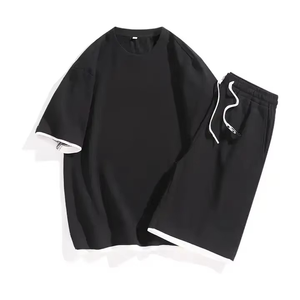 Ensemble t-shirt et short en coton noir pour homme, col rond, couleur unie, vêtements décontractés d'été, tissu respirant en maille - Product Image 1