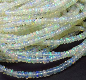 High Quality Natural Ethiopian Welo Opal Rondelle Gemstone Beads 4mm 16" Strand Smooth Full Flash White <b>Rainbow</b> Color Play - Product Image 1