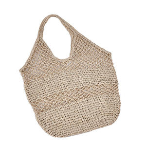 Capturez l'esprit de la vie urbaine moderne avec ce sac élégant en fil naturel, doté d'un corps texturé et de bretelles robustes. - Product Image 1