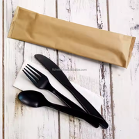 Umwelt freundliches schweres, schwarz-weiß verpacktes Einweg-Plastik messer und-gabeln Besteckset mit Serviette.