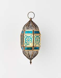 Lanterne marocaine décorative en fer ajouré pour porte-bougie, créant de magnifiques ombres à motifs sur les murs - Product Image 1