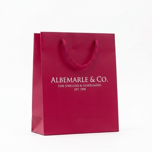 Sacs shopping en papier blanc de luxe faits à la main avec poignées découpées, personnalisables, laminés brillants, écologiques et recyclables pour l'emballage de détail - Product Image 4