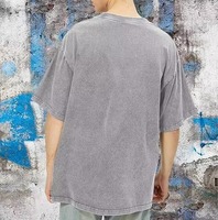 T-shirt en coton à manches courtes surdimensionné pour homme, col rond, imprimé, style jersey, avec la phrase « All We Need Is Money »