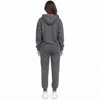 Survêtement pour femmes fabriqué avec un tissu sport extensible, coupe athlétique confortable, panneaux respirants, veste à fermeture éclair intégrale, poche fonctionnelle