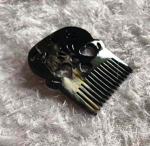 Peine de cuerno natural de diseño creativo con dientes largos y diseño de aspecto fantasmal, peine para el cuidado del cabello y peinado elegante, para decoración del hogar al mejor precio. - Product Image 1