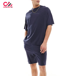 ชุดเสื้อยืดและกางเกงขาสั้นสีพื้นคุณภาพสูง ชุดออกกำลังกายฤดูร้อน เสื้อยืดแห้งเร็วและกางเกงขาสั้น ชุดเสื้อยืดและกางเกงขาสั้นพร้อมโลโก้สั่งทำสำหรับผู้ชาย - Product Image 1