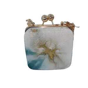 Aurora Glow Resin Handbag with Golden Silhouette and Floral Charm