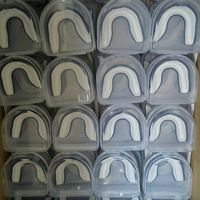 Protège-dents de boxe personnalisé en silicone lavable, écologique, pour la protection des dents lors de la pratique du Muay Thai, du MMA et des entraînements de sparring.