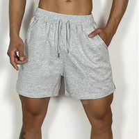 Shorts décontractés pour hommes en nylon/polyester gris uni avec taille élastique et poches, taille mi-haute, en tissu tricoté respirant, personnalisable